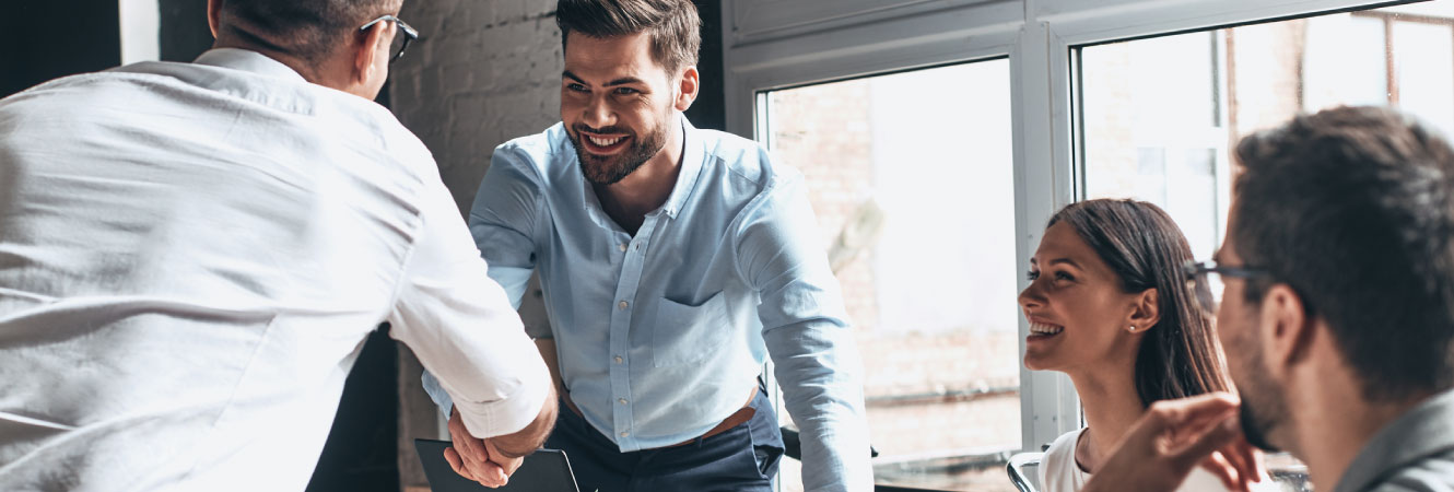 two businessmen shaking hands